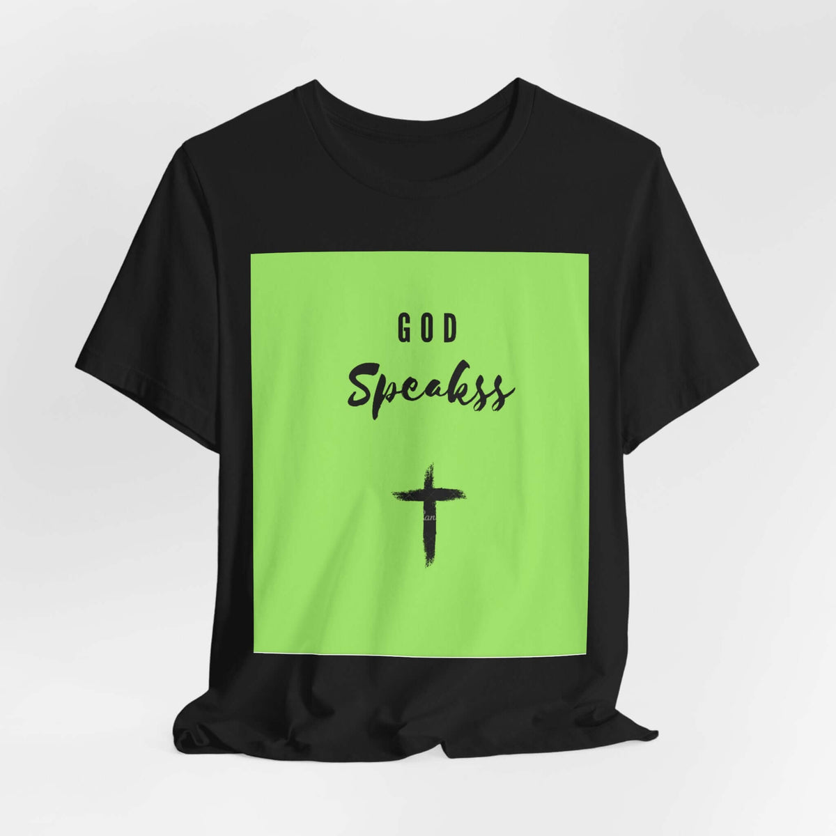 God Speakss Unisex Jersey short sleeve tee with green graphic design on a black background.