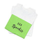 God Speakss Unisex Jersey t-shirt with vibrant green and white design folded neatly.