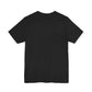 Back view of God Speakss Unisex Jersey in solid black, showcasing ribbed collar and short sleeves.